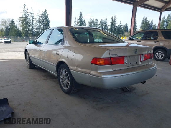 2001 Toyota Camry LE z VIN JT2BF28K110320365, wystawiony jako IAAI lot #41993343 z przebiegiem 211 458 mil mil oraz . Historia ofert i sprzedaży dostępna na DreamBid. Obrazek 3.