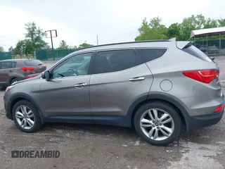2014 Hyundai Santa Fe z VIN 5XYZW3LA2EG217854, wystawiony jako IAAI lot #42318822 z przebiegiem 120 234 mil mil oraz . Historia ofert i sprzedaży dostępna na DreamBid. Obrazek 14.