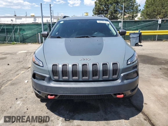 2014 Jeep Cherokee Trailhawk z VIN 1C4PJMBBXEW134939, wystawiony jako Copart lot #56579125 z przebiegiem 155 693 mil mil oraz Czysty tytuł • Clean title. Historia ofert i sprzedaży dostępna na DreamBid. Obrazek 5.