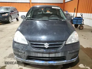 2005 Suzuki Aerio SX z VIN JS2RC62H155300229, wystawiony jako Copart lot #44822125 z przebiegiem 260 956 mil mil oraz Szkoda całkowita • Salvage title. Historia ofert i sprzedaży dostępna na DreamBid. Obrazek 5.