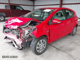 2015 Toyota Prius c One with VIN JTDKDTB33F1581101, listed as a IAAI auction lot 41203345 with 23,941 mi miles. Bid and sale history available at carsss.com. Image 2.