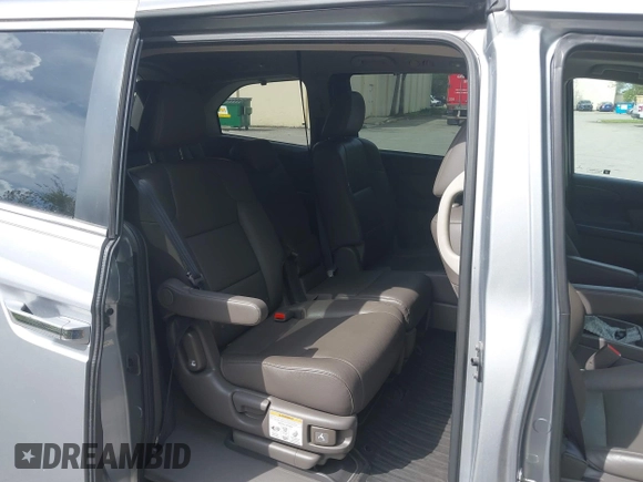 2017 Honda Odyssey EX-L with VIN 5FNRL5H66HB013840, listed as a IAAI auction lot 41768858 with 100,547 mi miles and . Bid and sale history available at DreamBid. Image 8.