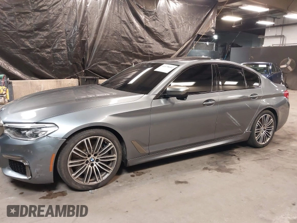 2020 BMW 5 Series M550i xDrive with VIN WBAJS7C00LCD83735, listed as a IAAI auction lot 41478682 with 39,299 mi miles and . Bid and sale history available at DreamBid. Image 6.