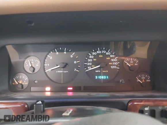 1997 Jeep Grand Cherokee Limited with VIN 1J4GZ78Y0VC684023, listed as a IAAI auction lot 42090436 with 310,831 mi miles. Bid and sale history available at carsss.com. Image 7.