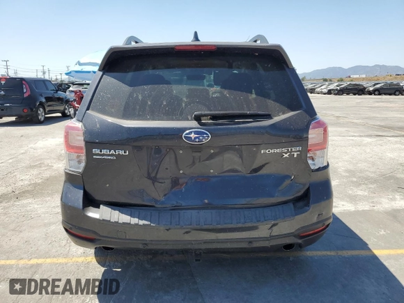 2017 Subaru Forester Touring with VIN JF2SJGWC1HH476823, listed as a Copart auction lot 59230835 with 107,711 mi miles and Salvage title. Bid and sale history available at DreamBid. Image 6.
