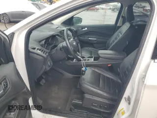 2018 Ford Escape Titanium z VIN 1FMCU9J94JUB49827, wystawiony jako Copart lot #55697385 z przebiegiem 98 682 mil mil oraz Szkoda całkowita • Salvage title. Historia ofert i sprzedaży dostępna na DreamBid. Obrazek 7.