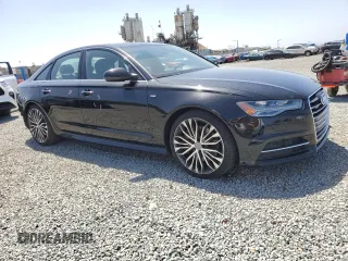 2016 Audi A6 Premium Plus with VIN WAUGFAFC1GN076986, listed as a Copart auction lot 56123585 with 100,837 mi miles and Salvage title. Bid and sale history available at DreamBid. Image 4.