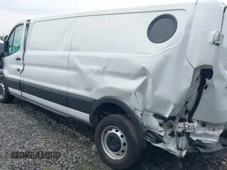 2020 Ford Transit Cargo with VIN 1FTYE1Y86LKA08570, listed as a IAAI auction lot 41571478 with 21,405 mi miles and . Bid and sale history available at DreamBid. Image 3.
