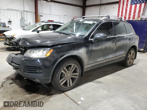 2011 Volkswagen Touareg Exec with VIN WVGFK9BP6BD006430, listed as a Copart auction lot 84288014 with 186,189 mi miles and Salvage Title. Bid and sale history available at DreamBid. Image 1.