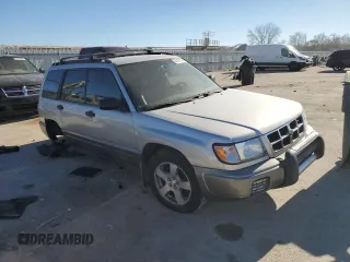 1999 Subaru Forester S with VIN JF1SF6559XH747645, listed as a Copart auction lot 83070134 with 0 mi miles and Salvage Title. Bid and sale history available at carsss.com. Image 4.
