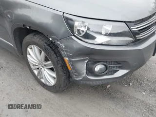2013 Volkswagen Tiguan SE with VIN WVGAV7AX9DW547633, listed as a IAAI auction lot 42009704 with 51,826 mi miles and . Bid and sale history available at DreamBid. Image 6.