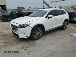 2016 Mazda CX-9 Grand Touring с VIN JM3TCBDY3G0117248, выставлен на аукционе Copart как лот 59703595 с пробегом 109 922 миль миль и Списание • Salvage title. История ставок и продаж доступна на DreamBid. Изображение 1.