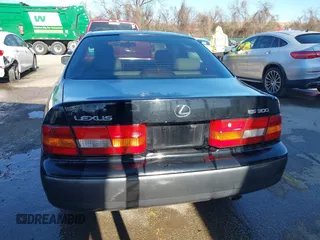 1997 Lexus ES 300 Luxury Sport Sdn with VIN JT8BF22GXV5003056, listed as a IAAI auction lot 41806886 with 130,063 mi miles. Bid and sale history available at carsss.com. Image 16.