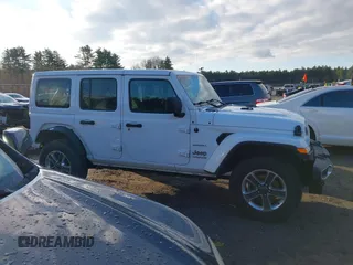 2020 Jeep Wrangler Unlimited Sahara with VIN 1C4HJXENXLW220910, listed as a IAAI auction lot 41090420 with 88,895 mi miles and . Bid and sale history available at DreamBid. Image 14.