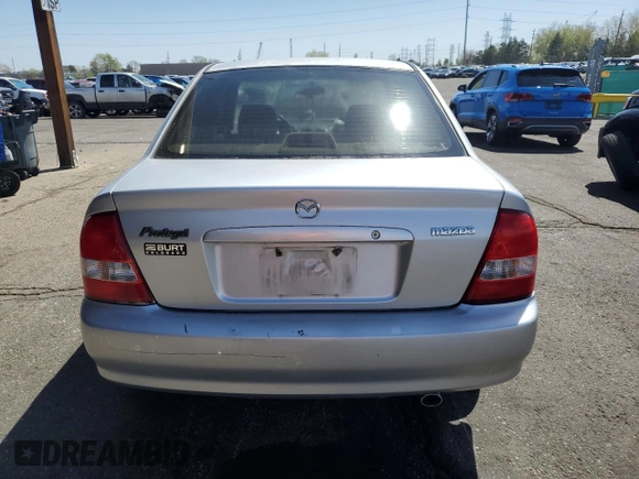 2003 Mazda Protege DX with VIN JM1BJ225730217866, listed as a Copart auction lot 53854075 with 105,782 mi miles and Salvage Title. Bid and sale history available at DreamBid. Image 6.