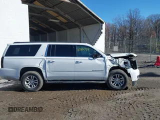 2016 Chevrolet Suburban LT with VIN 1GNSKHKCXGR206948, listed as a IAAI auction lot 41842774 with 190,935 mi miles. Bid and sale history available at carsss.com. Image 14.