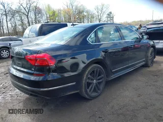 2016 Volkswagen Passat 1.8T S with VIN 1VWAT7A34GC068563, listed as a IAAI auction lot 41983202 with 60,562 mi miles. Bid and sale history available at carsss.com. Image 4.