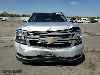 2020 Chevrolet Suburban Premier with VIN 1GNSCJKC0LR216855, listed as a Copart auction lot 72287114 with 94,642 mi miles and Salvage Title. Bid and sale history available at carsss.com. Image 11.