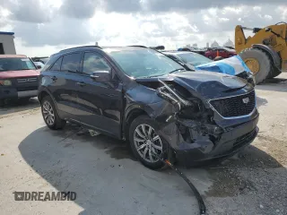 2022 Cadillac XT4 FWD Sport with VIN 1GYFZER46NF119009, listed as a Copart auction lot 57651725 with 37,896 mi miles and Salvage title. Bid and sale history available at DreamBid. Image 4.