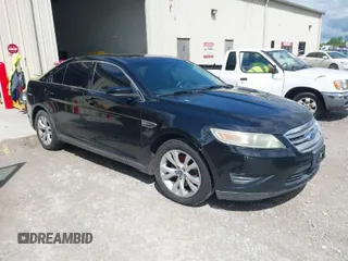 2012 Ford Taurus SEL with VIN 1FAHP2EWXCG102608, listed as a IAAI auction lot 41993132 with 219,907 mi miles and . Bid and sale history available at carsss.com. Image 1.