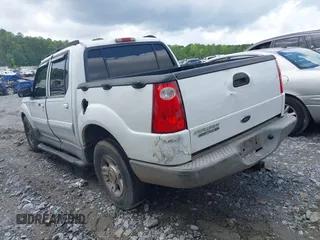 2004 Ford Explorer Sport Trac XLS z VIN 1FMZU67K44UA57074, wystawiony jako IAAI lot #42505321 z przebiegiem 282 904 mil mil oraz . Historia ofert i sprzedaży dostępna na DreamBid. Obrazek 3.