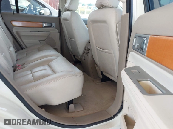 2007 Lincoln MKX with VIN 2LMDU88C77BJ33821, listed as a IAAI auction lot 42682904 with 150,877 mi miles and . Bid and sale history available at DreamBid. Image 8.