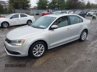 2011 Volkswagen Jetta SE with VIN 3VWDZ7AJ4BM387236, listed as a IAAI auction lot 41875995 with 202,028 mi miles and . Bid and sale history available at DreamBid. Image 2.