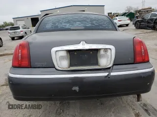 2001 Lincoln Town Car Signature with VIN 1LNHM82W11Y683915, listed as a Copart auction lot 50395865 with Not provided miles and Non repairable. Bid and sale history available at DreamBid. Image 6.
