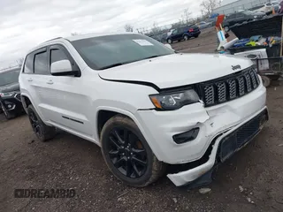 2018 Jeep Grand Cherokee Altitude with VIN 1C4RJFAG2JC284301, listed as a IAAI auction lot 41832657 with 97,160 mi miles and . Bid and sale history available at DreamBid. Image 1.