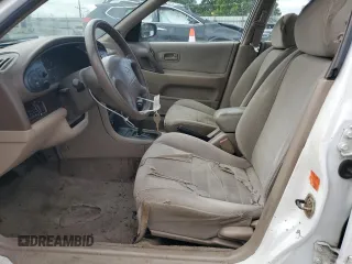 1997 Nissan Altima XE with VIN 1N4BU31D7VC117019, listed as a Copart auction lot 63961254 with 224,947 mi miles and Salvage Title. Bid and sale history available at carsss.com. Image 7.