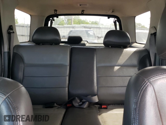 2003 Ford Escape XLT Popular 2 with VIN 1FMYU93133KB35168, listed as a Copart auction lot 57303335 with 197,368 mi miles and Salvage title. Bid and sale history available at DreamBid. Image 10.