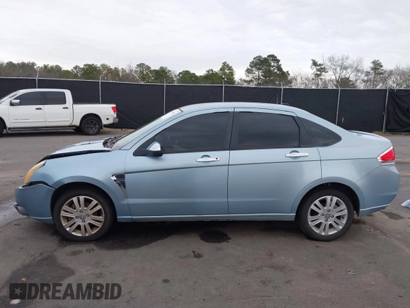 2008 Ford Focus SE with VIN 1FAHP35N78W270569, listed as a IAAI auction lot 38518647 with 173,674 mi miles. Bid and sale history available at carsss.com. Image 14.