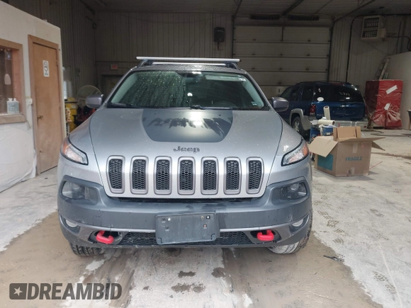 2014 Jeep Cherokee Trailhawk z VIN 1C4PJMBS4EW254963, wystawiony jako IAAI lot #42065845 z przebiegiem 187 356 mil mil oraz . Historia ofert i sprzedaży dostępna na DreamBid. Obrazek 12.