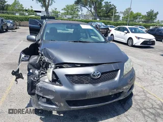 2010 Toyota Corolla with VIN 1NXBU4EE3AZ256356, listed as a IAAI auction lot 42371874 with 160,800 mi miles and . Bid and sale history available at DreamBid. Image 12.