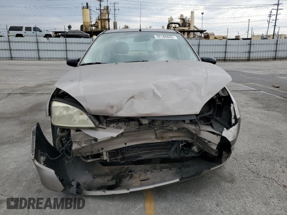 2005 Ford Focus S with VIN 1FAFP34N55W105530, listed as a Copart auction lot 59186695 with 136,204 mi miles and Salvage title. Bid and sale history available at DreamBid. Image 5.