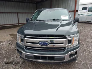 2018 Ford F-150 XL with VIN 1FTEW1EG4JKE17790, listed as a IAAI auction lot 42128519 with 153,740 mi miles. Bid and sale history available at carsss.com. Image 6.