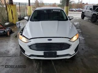 2020 Ford Fusion SE z VIN 3FA6P0T92LR173321, wystawiony jako Copart lot #86585494 z przebiegiem 102 285 mil mil oraz Szkoda całkowita • Salvage title. Historia ofert i sprzedaży dostępna na DreamBid. Obrazek 5.
