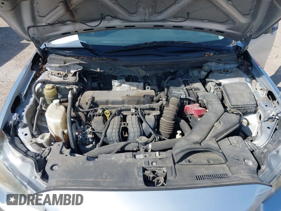 2010 Mitsubishi Lancer DE with VIN JA32U1FU4AU015574, listed as a IAAI auction lot 41770332 with 125,458 mi miles. Bid and sale history available at carsss.com. Image 10.