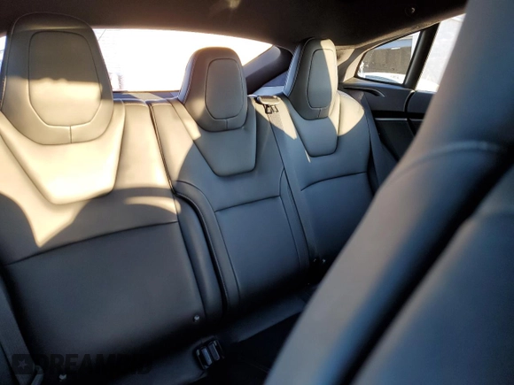 2019 Tesla Model S 75D with VIN 5YJSA1E23KF330239, listed as a Copart auction lot 86737544 with Not provided miles and Salvage title. Bid and sale history available at DreamBid. Image 11.