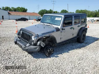 2016 Jeep Wrangler Unlimited Black Bear z VIN 1C4BJWDGXGL164364, wystawiony jako Copart lot #61469955 z przebiegiem 122 297 mil mil oraz Szkoda całkowita • Salvage title. Historia ofert i sprzedaży dostępna na DreamBid. Obrazek 1.