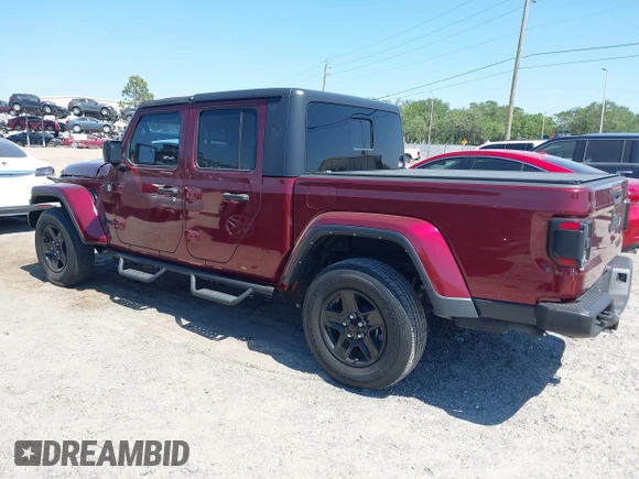 2021 Jeep Gladiator Freedom with VIN 1C6HJTAG2ML549434, listed as a IAAI auction lot 42059434 with 29,041 mi miles and . Bid and sale history available at DreamBid. Image 3.