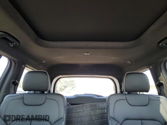 2023 Jeep Grand Cherokee Summit Reserve with VIN 1C4RJKEG3P8736786, listed as a Copart auction lot 59098804 with 16,064 mi miles and Salvage title. Bid and sale history available at DreamBid. Image 10.