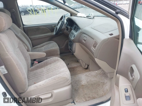 2001 Toyota Sienna LE with VIN 4T3ZF13C21U364354, listed as a IAAI auction lot 41991518 with 198,678 mi miles. Bid and sale history available at carsss.com. Image 5.