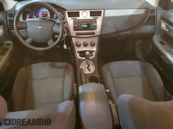2010 Chrysler Sebring Touring with VIN 1C3CC4FBXAN112107, listed as a Copart auction lot 53942745 with 134,629 mi miles and Salvage Title. Bid and sale history available at carsss.com. Image 8.