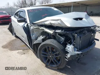 2019 Dodge Charger SXT with VIN 2C3CDXJGXKH706854, listed as a IAAI auction lot 41805578 with 60,240 mi miles and . Bid and sale history available at DreamBid. Image 6.
