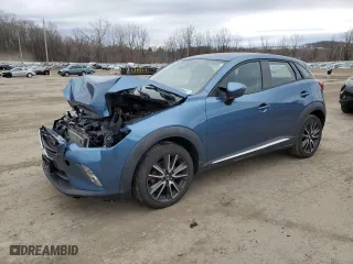 2018 Mazda CX-3 Grand Touring with VIN JM1DKFD72J0310660, listed as a Copart auction lot 48529505 with 65,108 mi miles and Salvage Title. Bid and sale history available at carsss.com. Image 1.