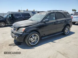 2006 Kia Sorento LX with VIN KNDJD733365525072, listed as a Copart auction lot 60260835 with 128,572 mi miles and Salvage title. Bid and sale history available at DreamBid. Image 1.