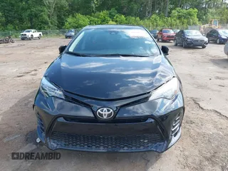2019 Toyota Corolla L with VIN 5YFBURHE1KP923291, listed as a IAAI auction lot 42173538 with 60,184 mi miles and . Bid and sale history available at DreamBid. Image 12.
