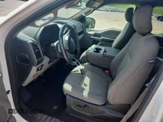 2019 Ford F-150 XL with VIN 1FTFW1E4XKFA16846, listed as a Copart auction lot 61345795 with 128,587 mi miles and Salvage title. Bid and sale history available at DreamBid. Image 7.