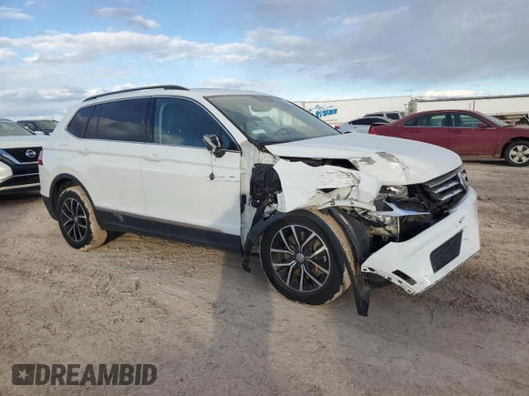 2021 Volkswagen Tiguan SE with VIN 3VV3B7AX9MM153671, listed as a Copart auction lot 83048724 with 45,086 mi miles and Salvage Title. Bid and sale history available at DreamBid. Image 4.
